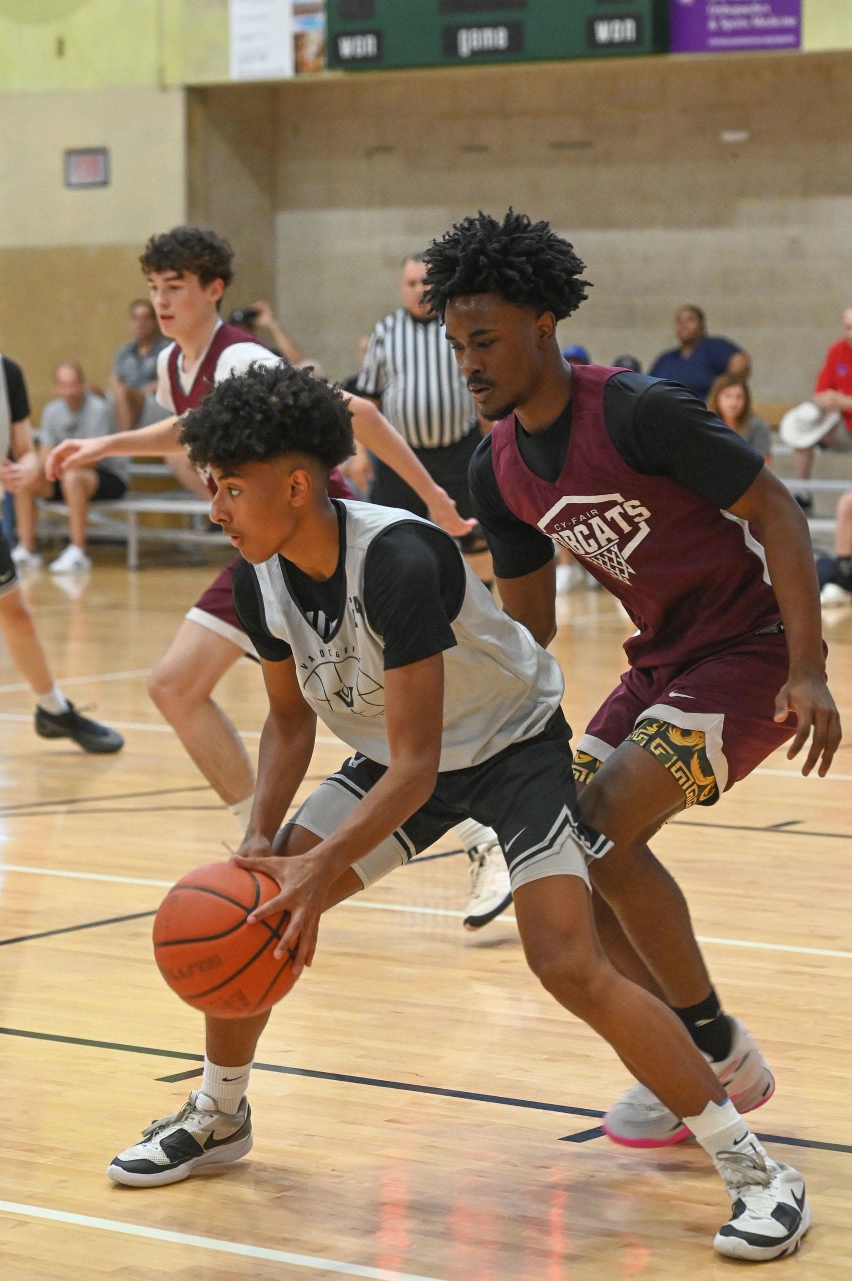 Vandegrift basketball players compete together