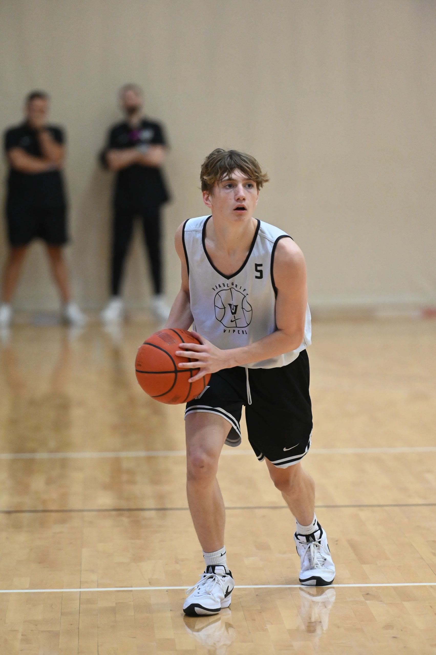 Vandegrift basketball players and staff during competition