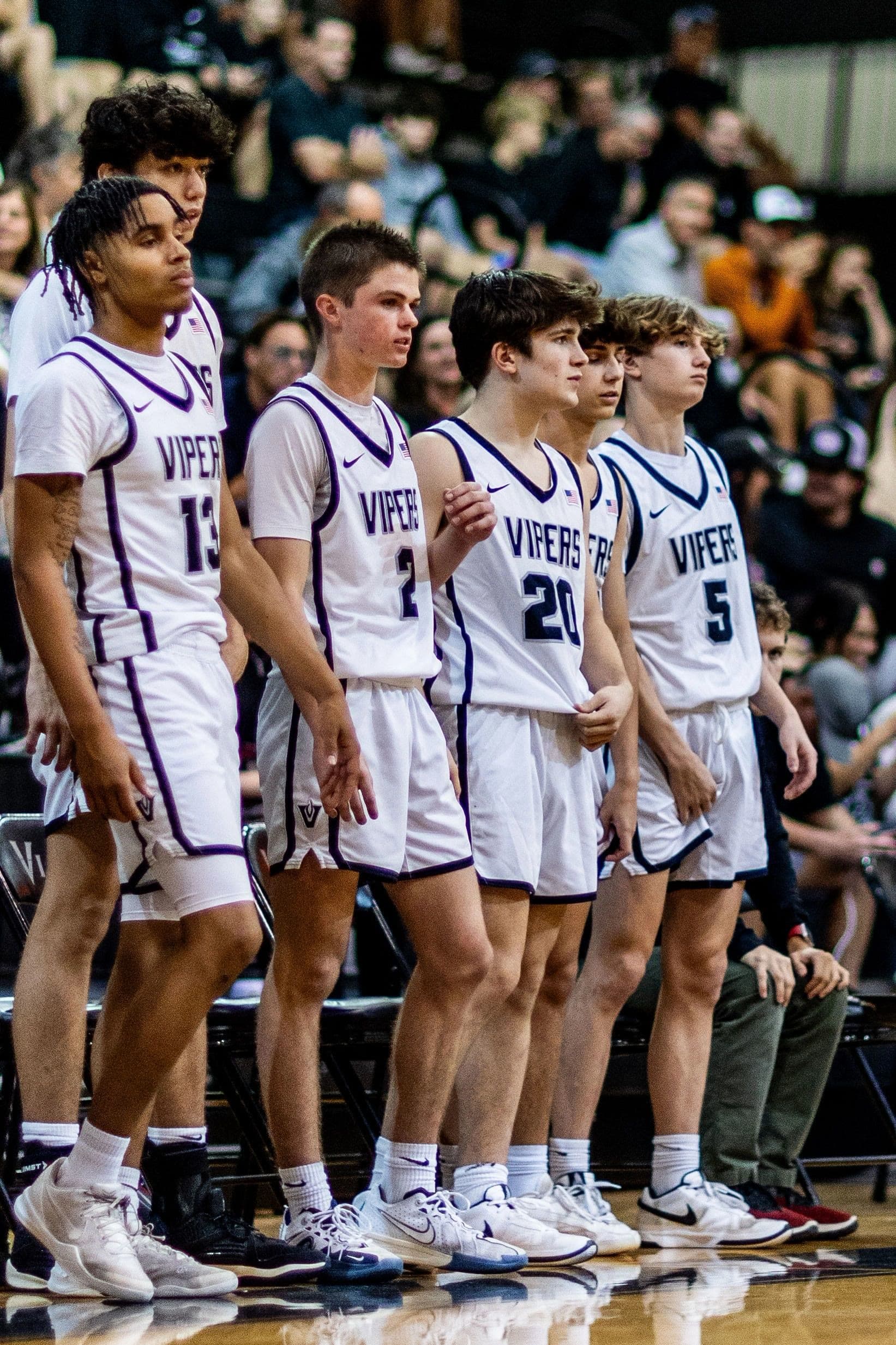 Vandegrift basketball players during game action